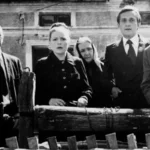 Kadr z W słońcu i w deszczu